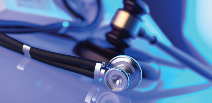 photo of stethoscope and gavel